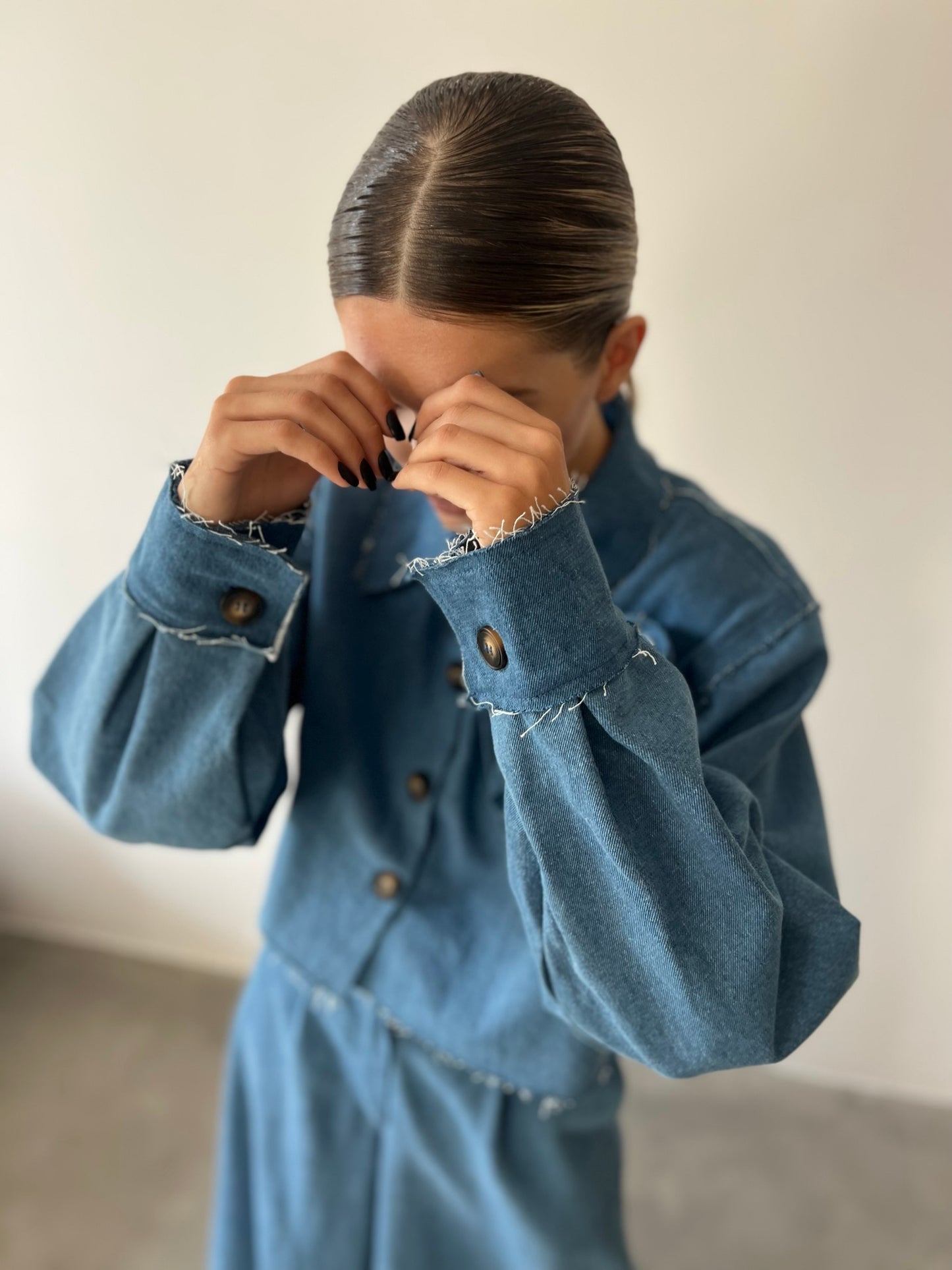 Denim jacket with a flower