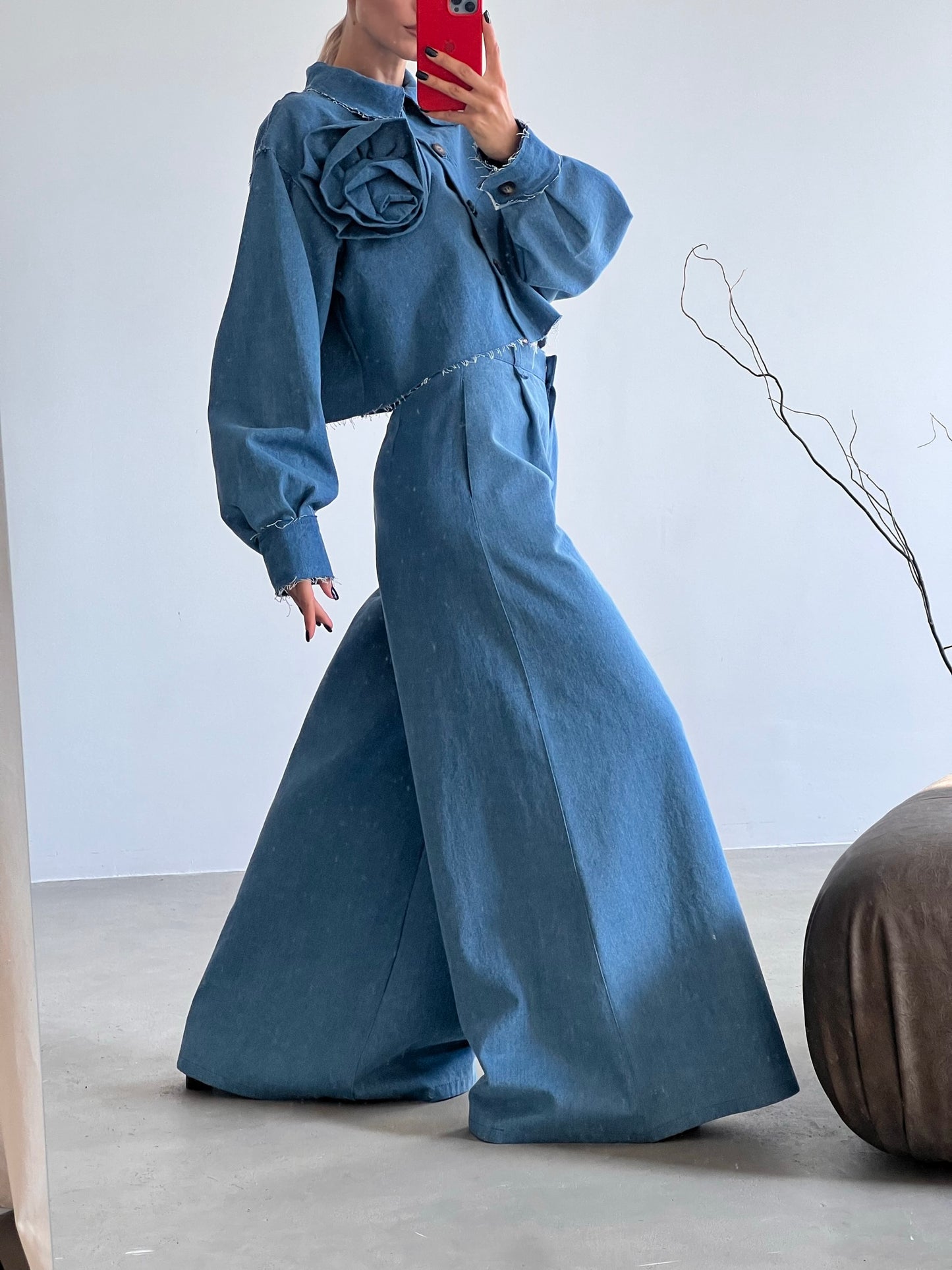 Denim jacket with a flower